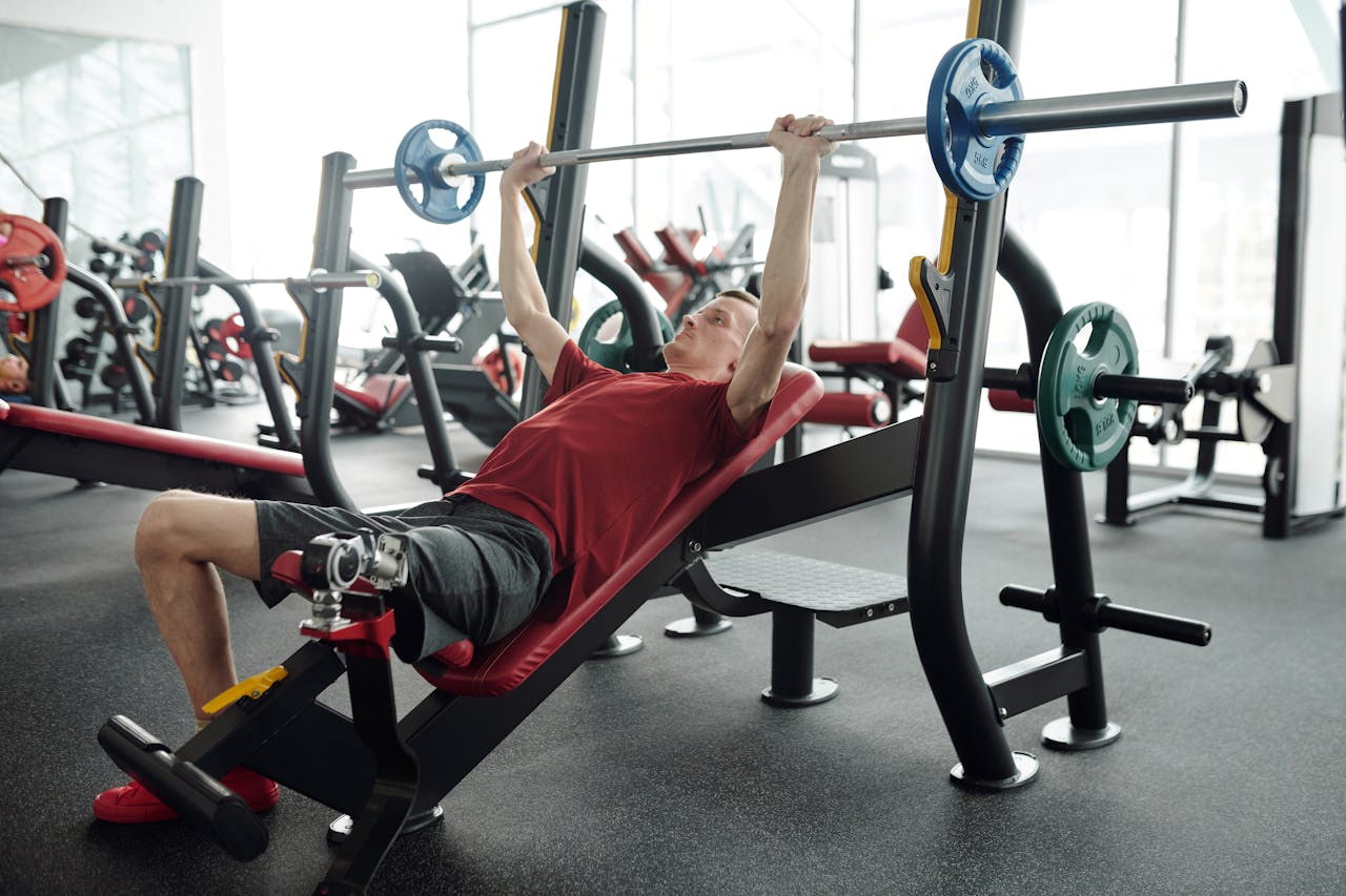 Photo Of Man Lifting A Barbell